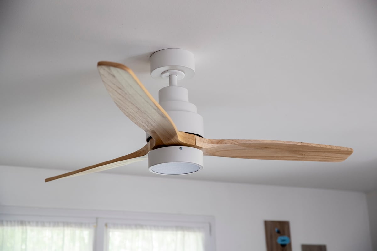 Modern ceiling fan circulating air in a Central Ohio home